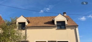Résultat d’un démoussage de toiture à Savigny-sur-Orge 91. Prise de vue Après le traitement